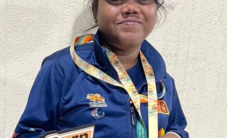 Dilmini wins a gold medal in Youth Asian para games.